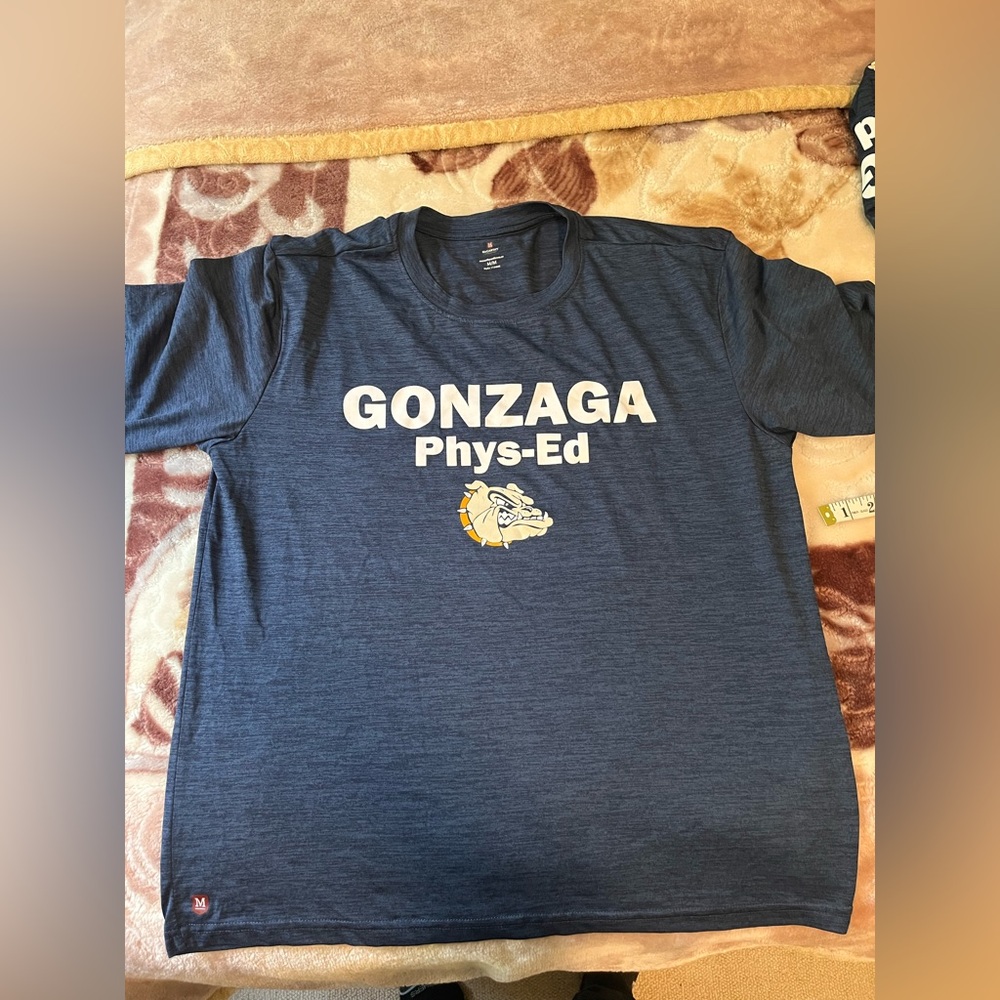St. Aloysius Gonzaga Secondary School: Gym Uniform 
2 Tops “M” & 1 Shorts “XS”